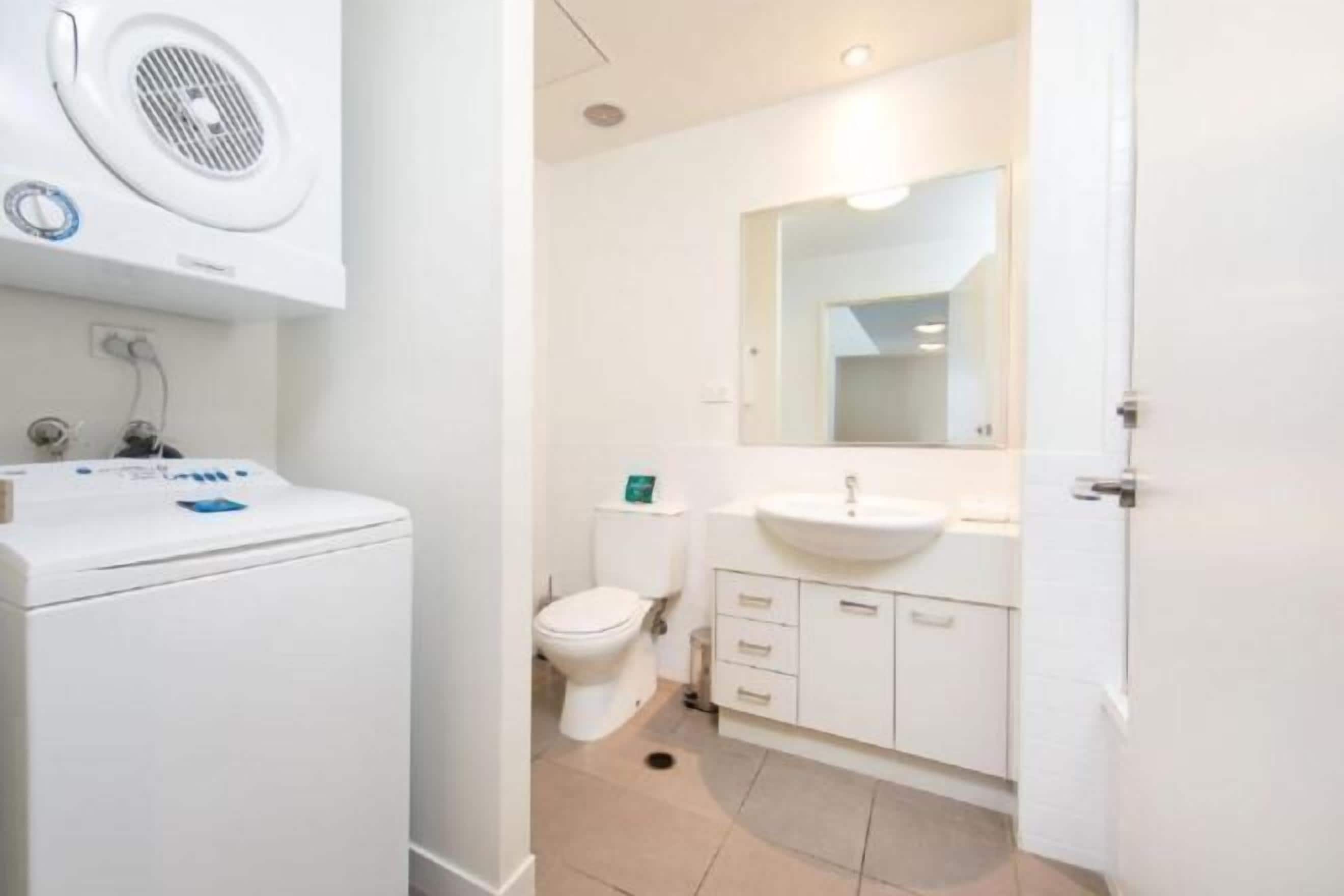 Designer toiletries, hair dryer, towels, soap