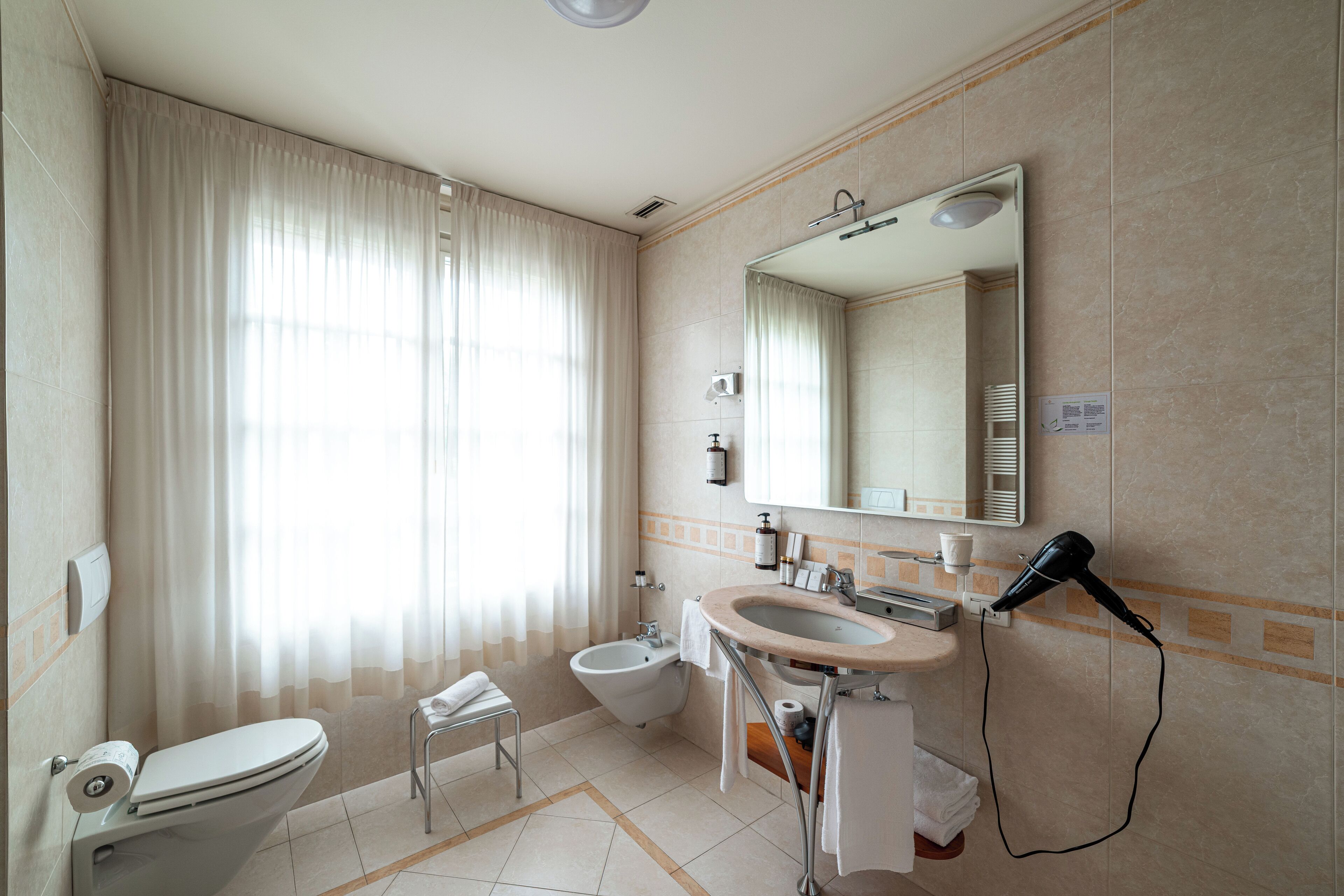 classic double or twin room | bathroom | shower, free toiletries, hair dryer, slippers