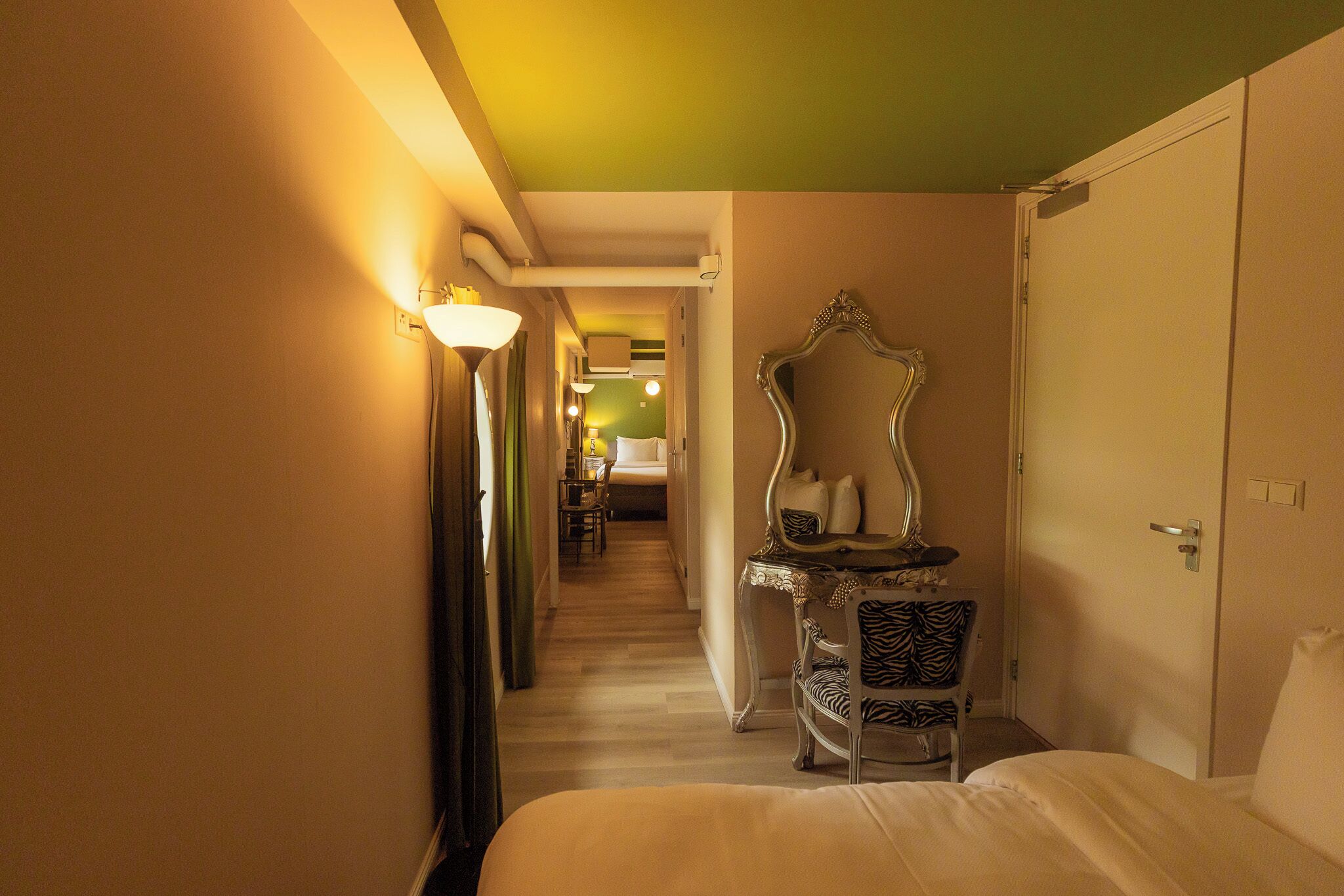 family room | individually furnished, desk, laptop workspace, cots/infant beds