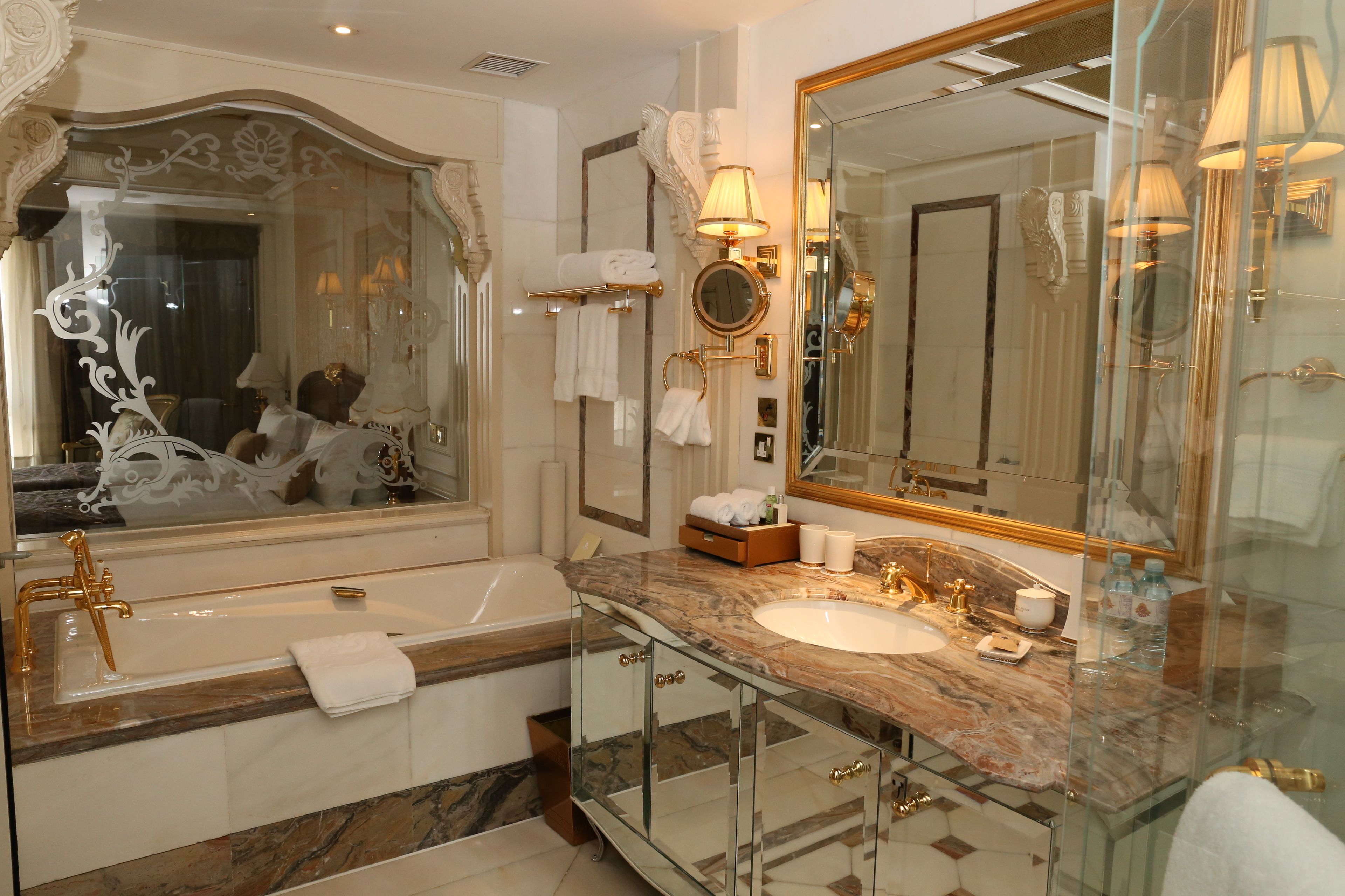 combined shower/bathtub, deep-soaking bathtub, hair dryer, bathrobes