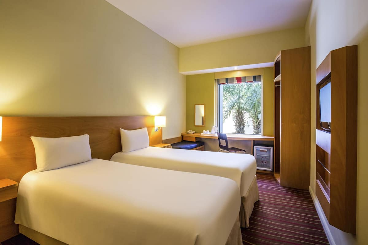 Room, 2 Twin Beds | Down comforters, individually furnished, desk, blackout drapes