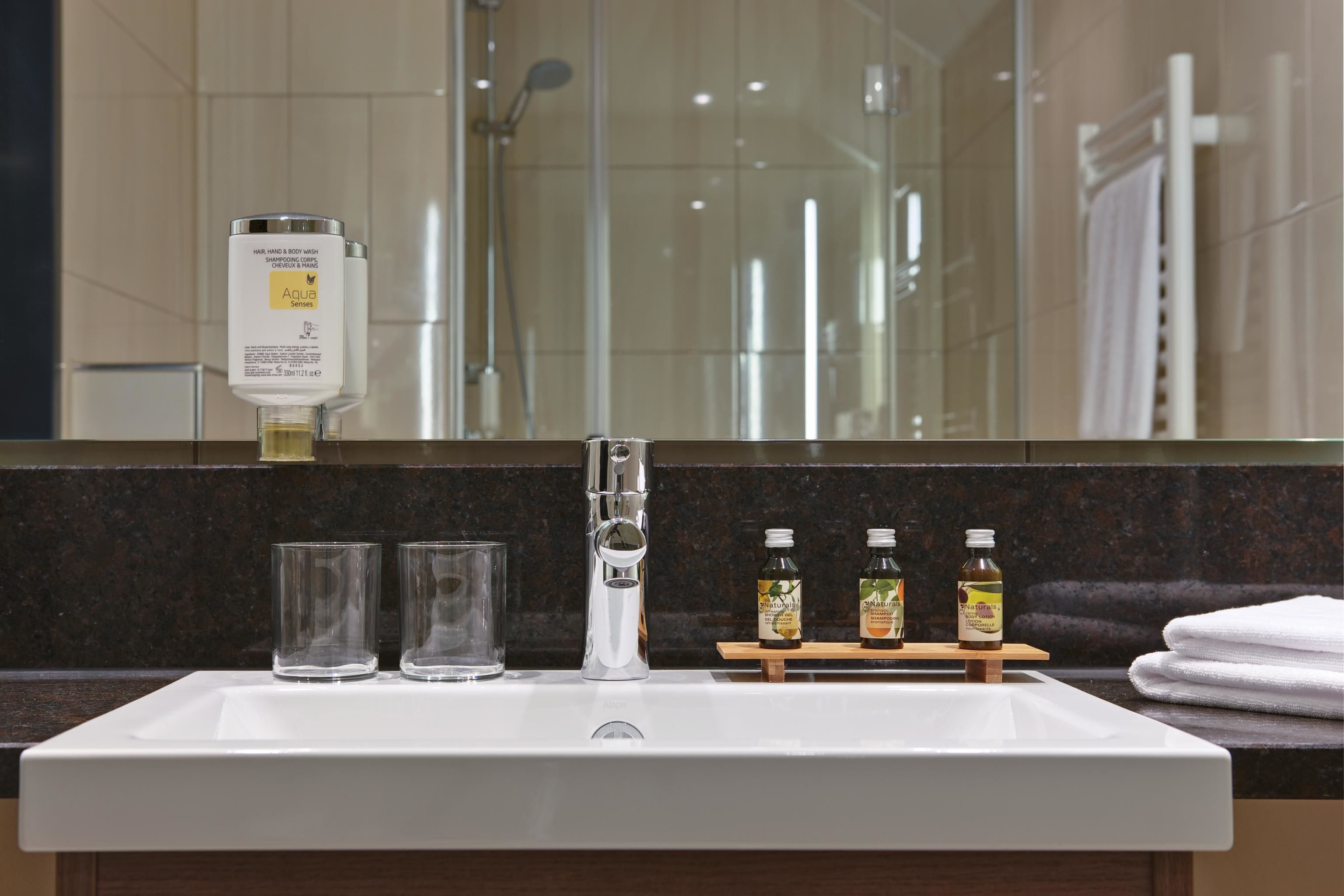 shower, free toiletries, hair dryer, towels