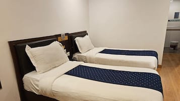 Premium bedding, pillow-top beds, minibar, in-room safe