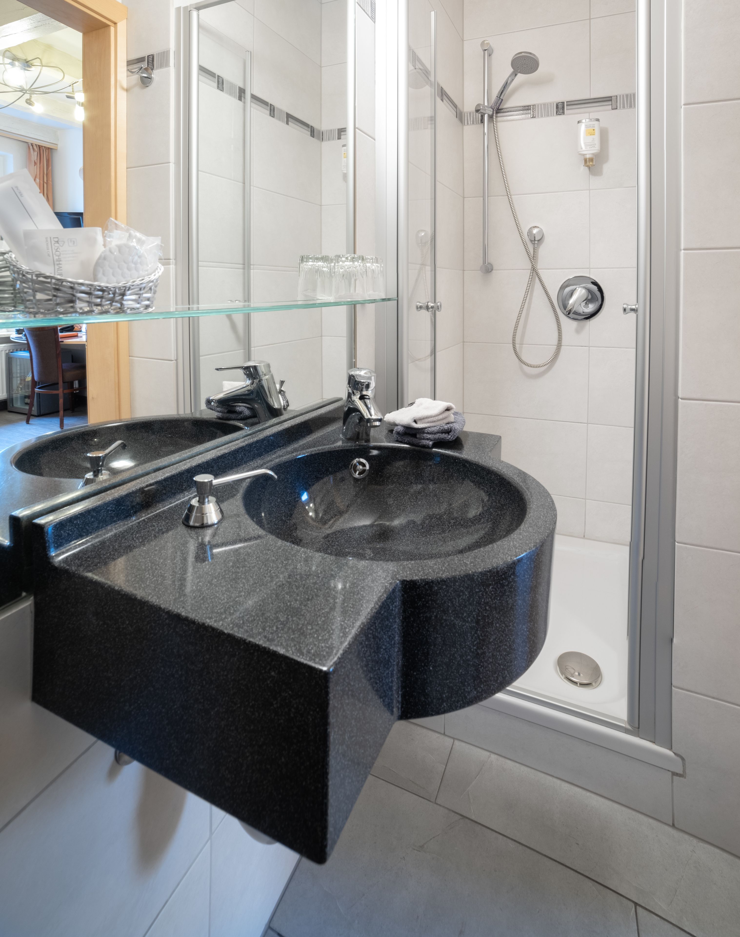 luxury single room | bathroom | free toiletries, hair dryer, slippers, towels