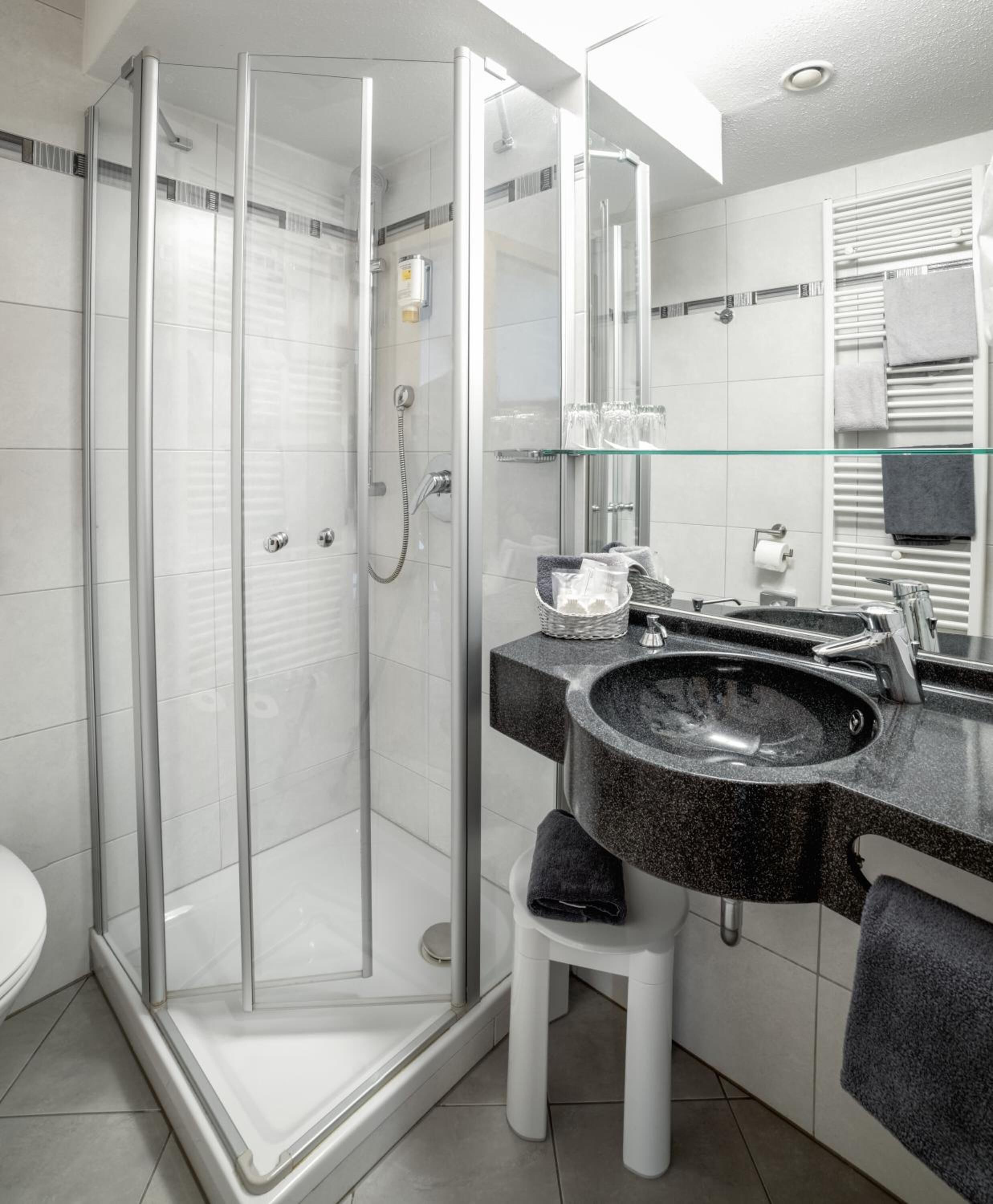 free toiletries, hair dryer, slippers, towels