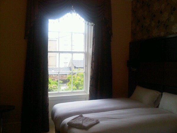Premium bedding, individually decorated, individually furnished, desk