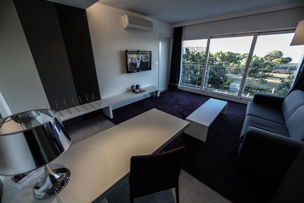 suite, 1 bedroom (sea side) | living area | 32-inch lcd tv with satellite channels, tv