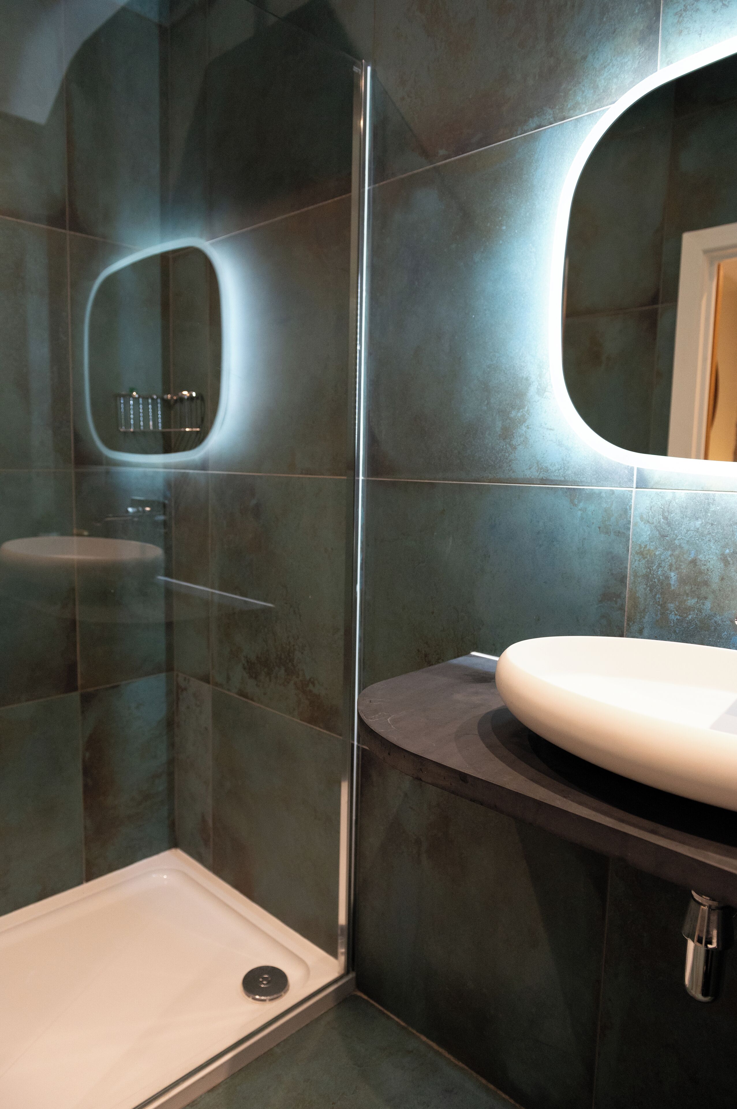 shower, designer toiletries, hair dryer, towels