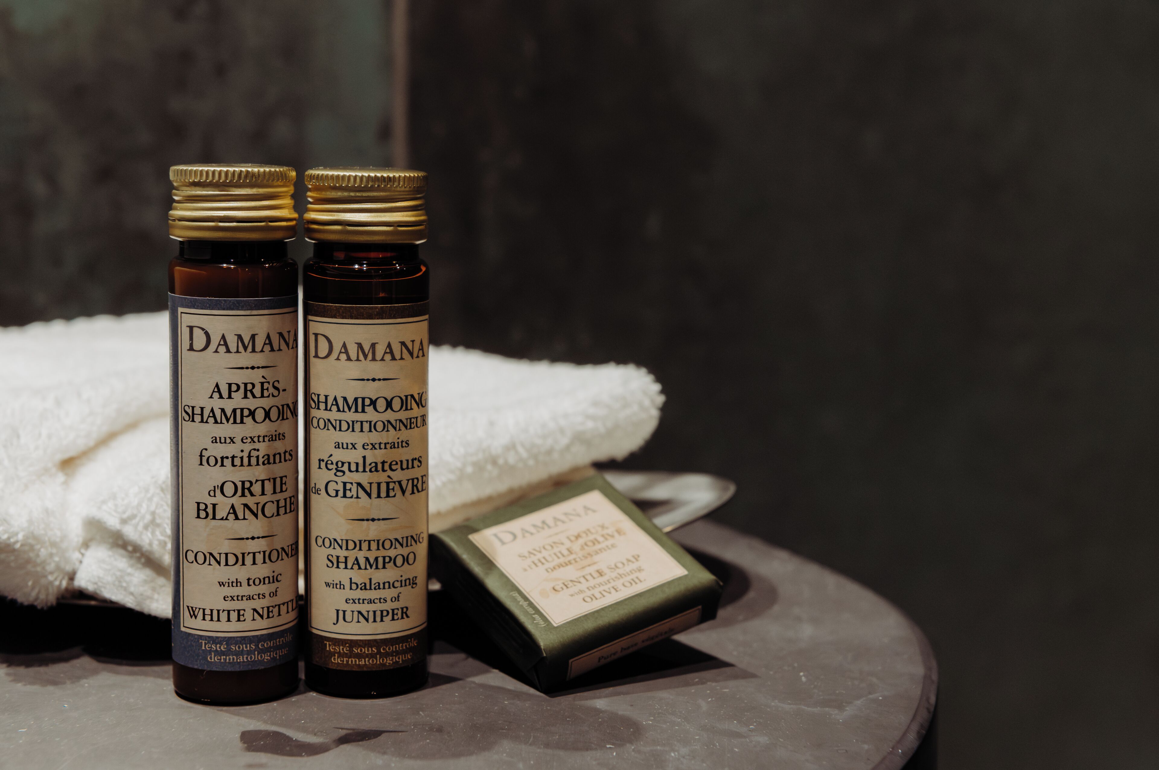 shower, designer toiletries, hair dryer, towels