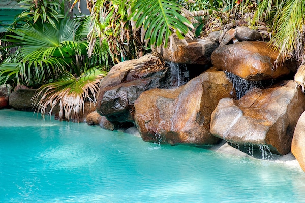 Seasonal outdoor pool, open 8:00 AM to 9:00 PM, pool umbrellas