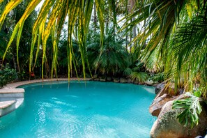 Seasonal outdoor pool, open 8:00 AM to 9:00 PM, pool umbrellas