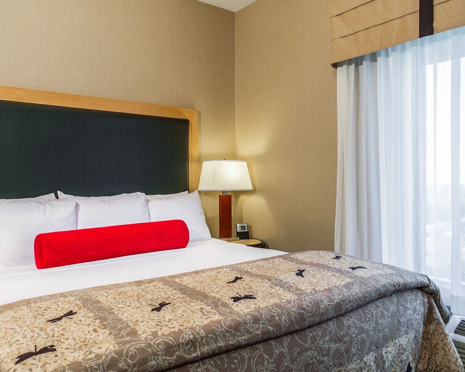 Premium bedding, pillow-top beds, desk, laptop workspace