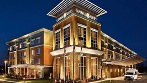 A multi-story hotel with a prominent sign reading "Cambria Suites". - Cambria Hotel Columbus - Polaris (Columbus)