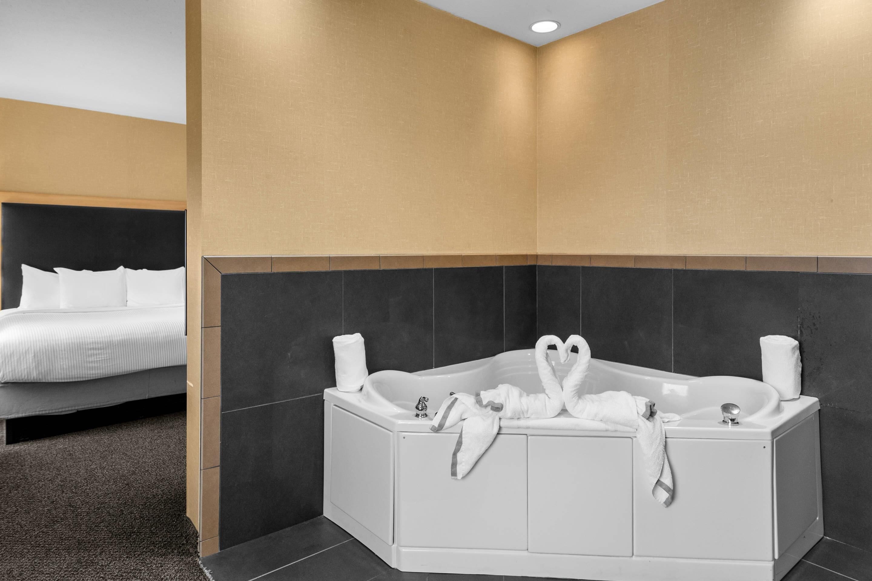 suite, 1 king bed with sofa bed, non smoking, hot tub (upgrade) | premium bedding, pillow-top beds, desk, laptop workspace