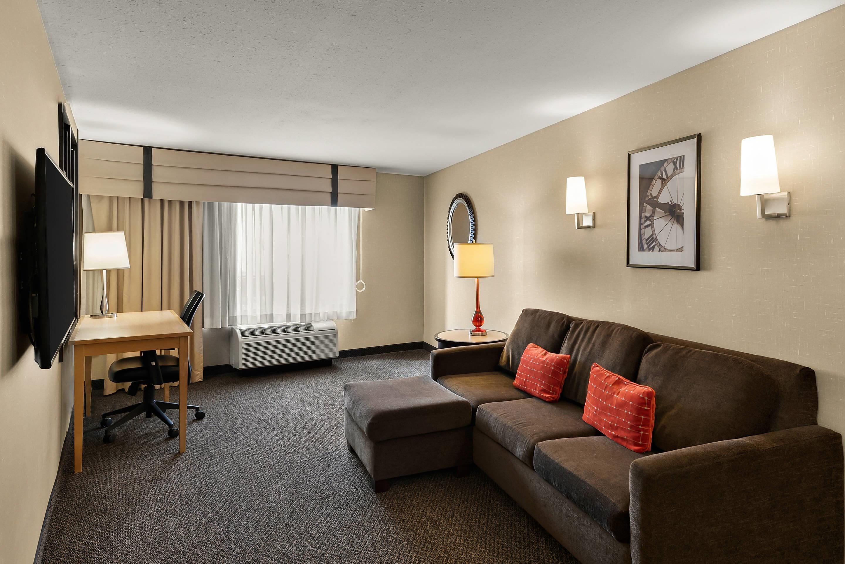 premium bedding, pillow-top beds, desk, laptop workspace