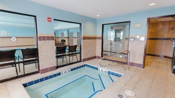Indoor pool, open 7 AM to 11 PM, pool loungers