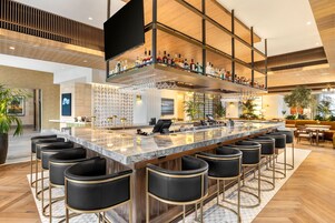 Rooftop bar, garden views, open daily