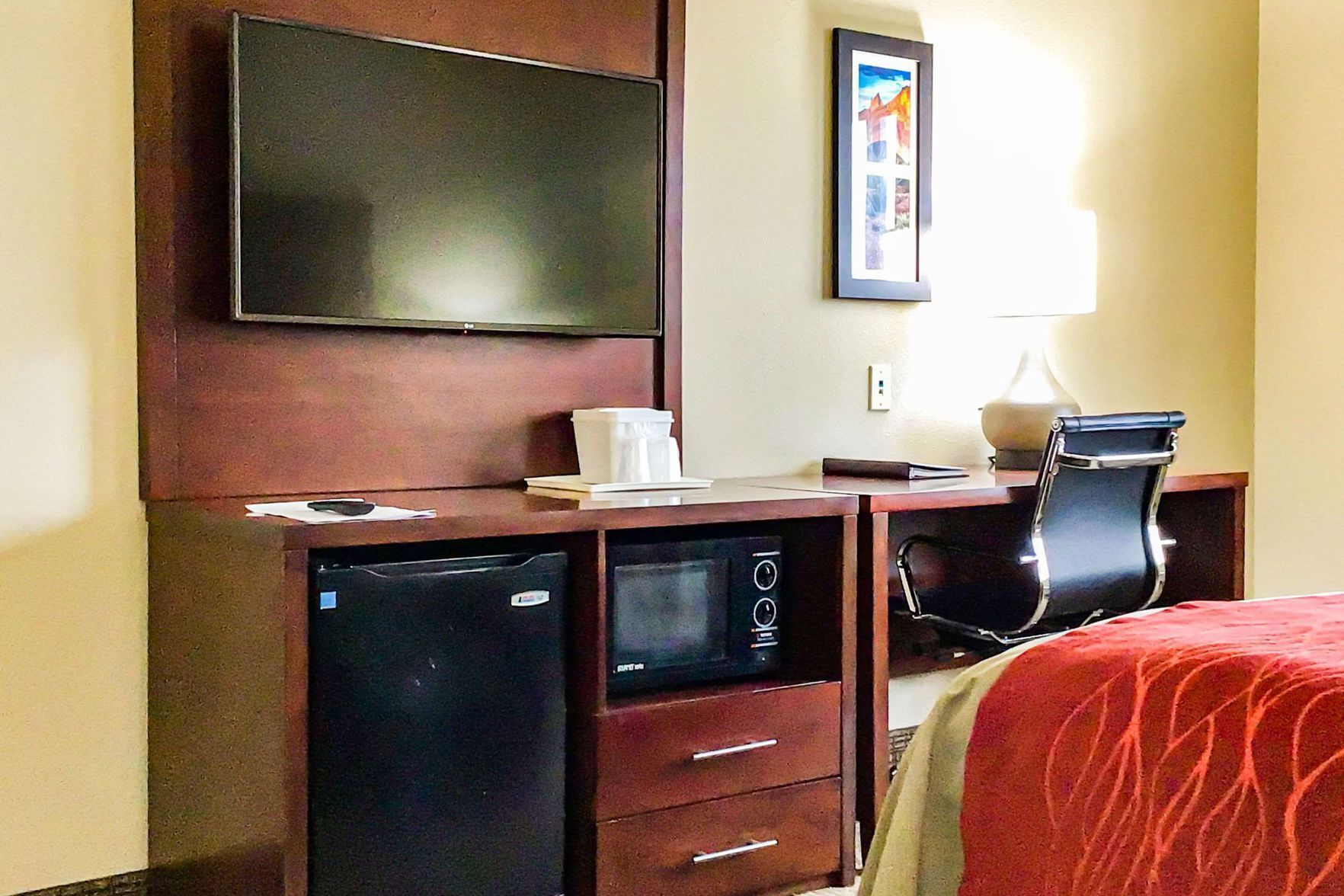 Premium bedding, laptop workspace, blackout drapes, iron/ironing board