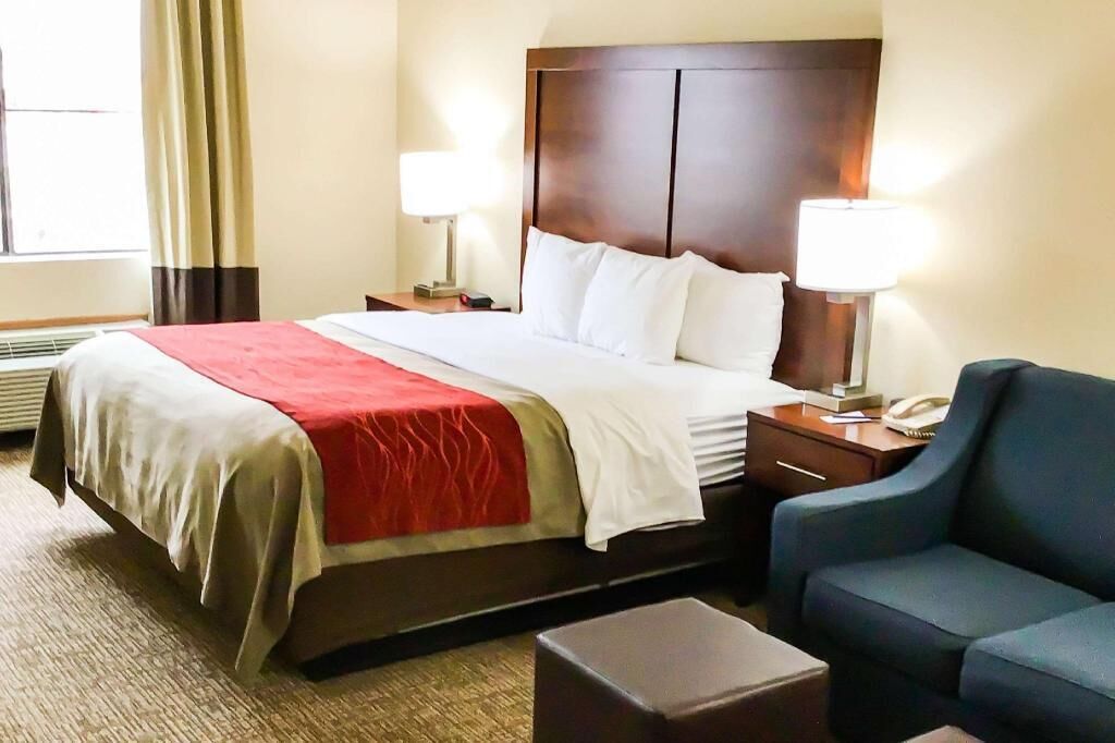 Premium bedding, laptop workspace, blackout drapes, iron/ironing board