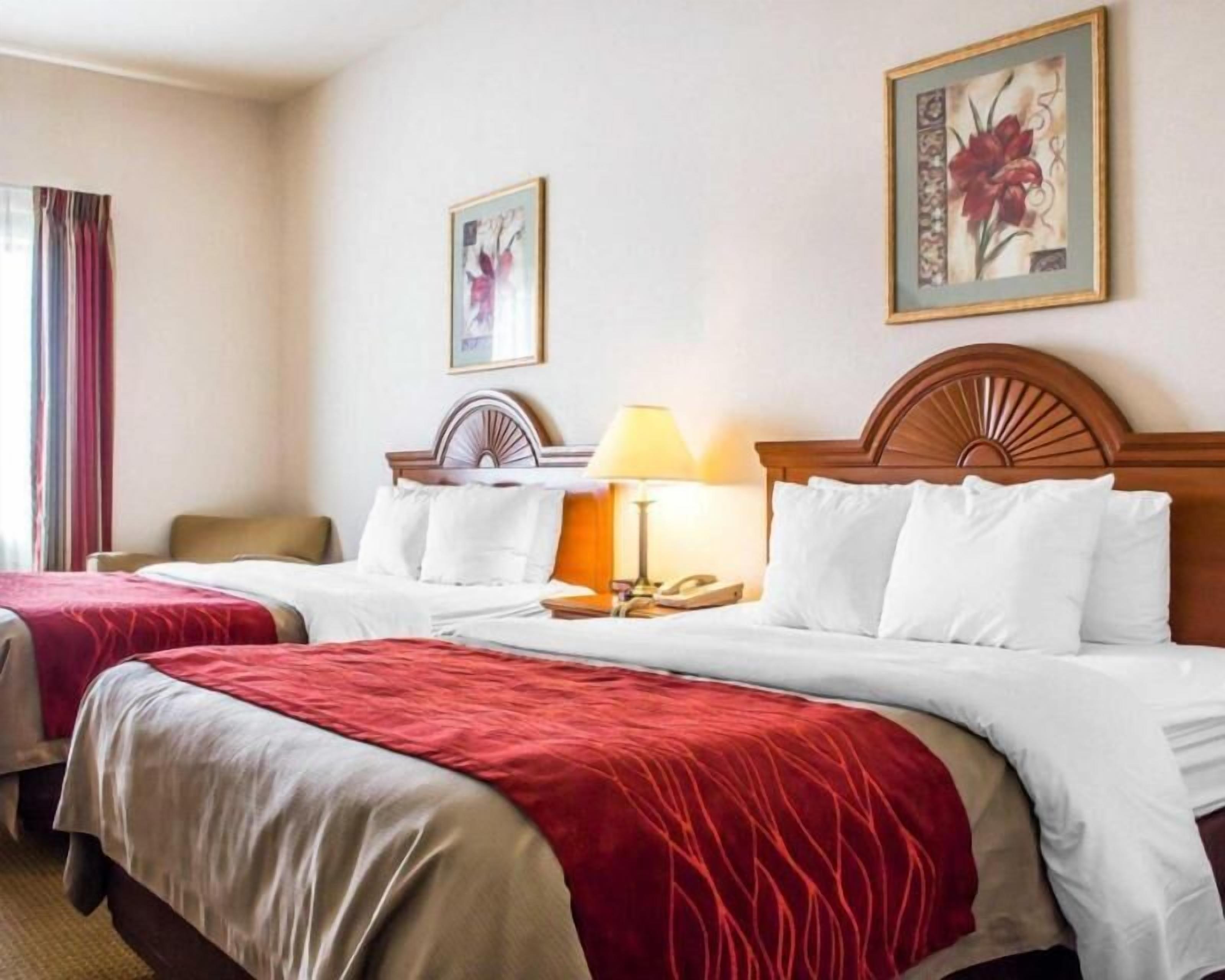 Premium bedding, laptop workspace, blackout drapes, iron/ironing board