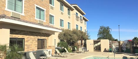 Outdoor pool, pool umbrellas, sun loungers