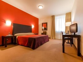 Minibar, in-room safe, individually decorated, desk