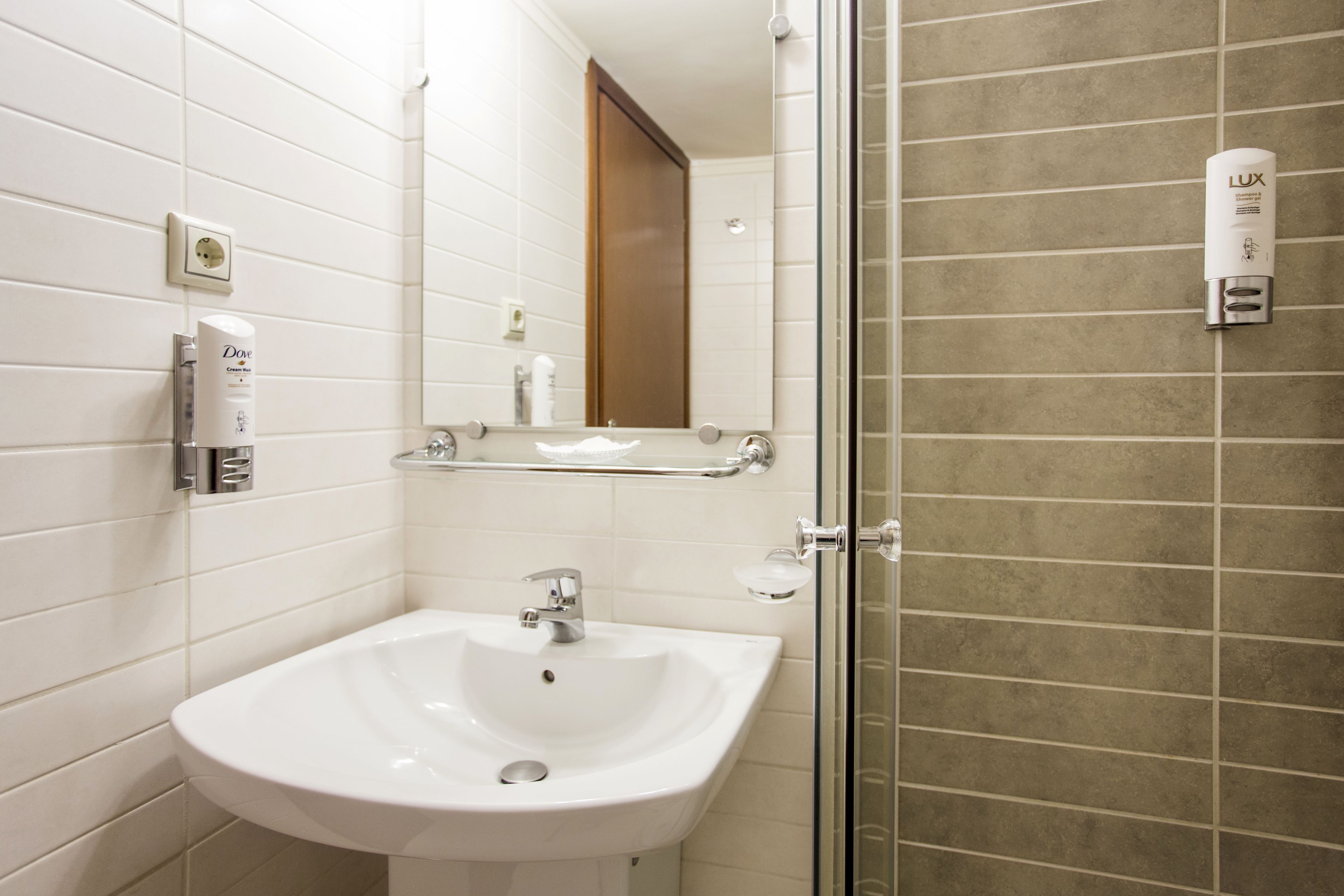 shower, free toiletries, hair dryer, slippers