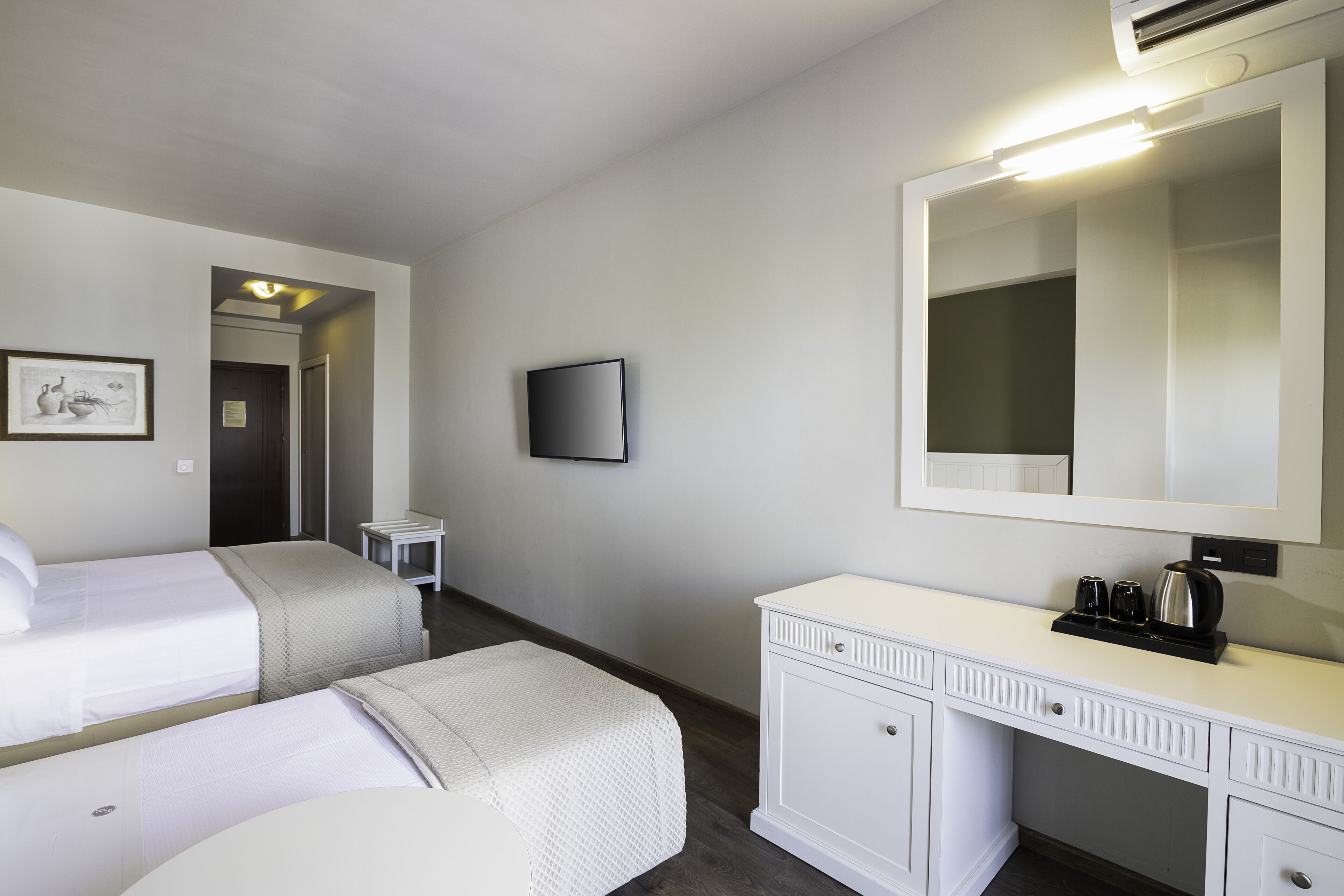 superior triple room | 1 bedroom, free minibar items, in-room safe, blackout curtains