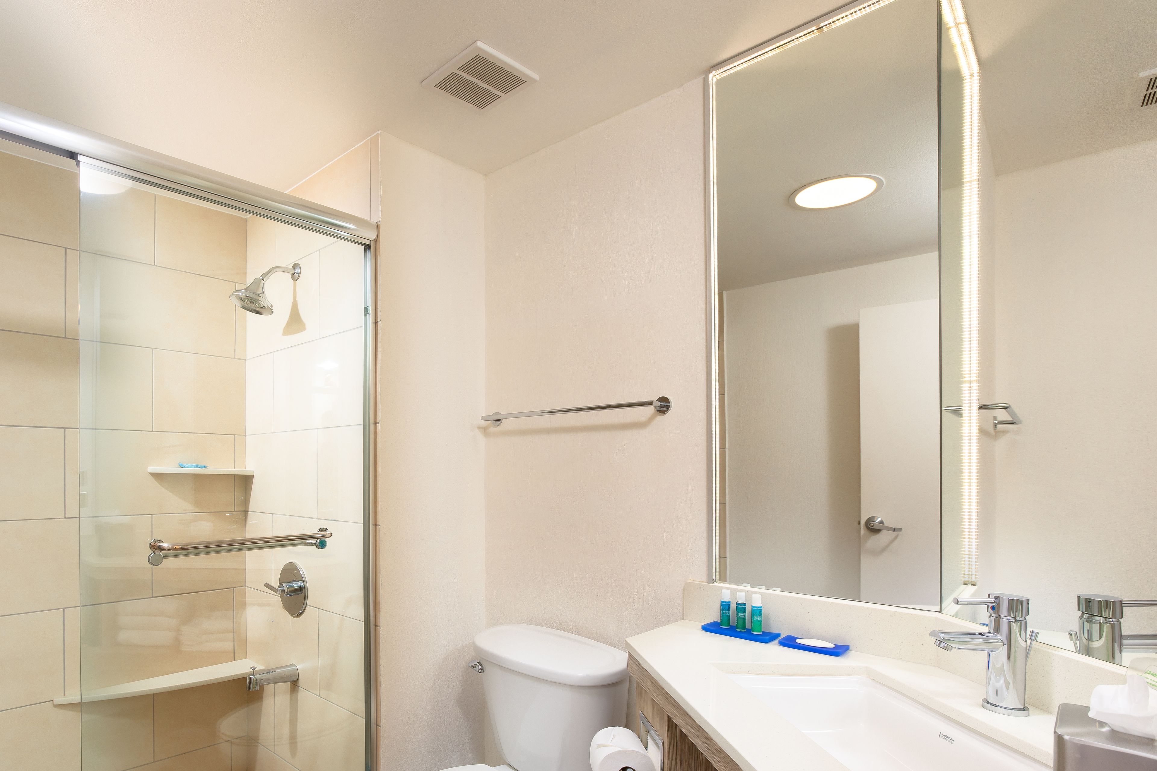 Rainfall showerhead, designer toiletries, hair dryer, towels