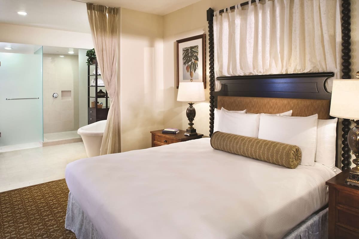 Premium bedding, down comforters, pillowtop beds, in-room safe
