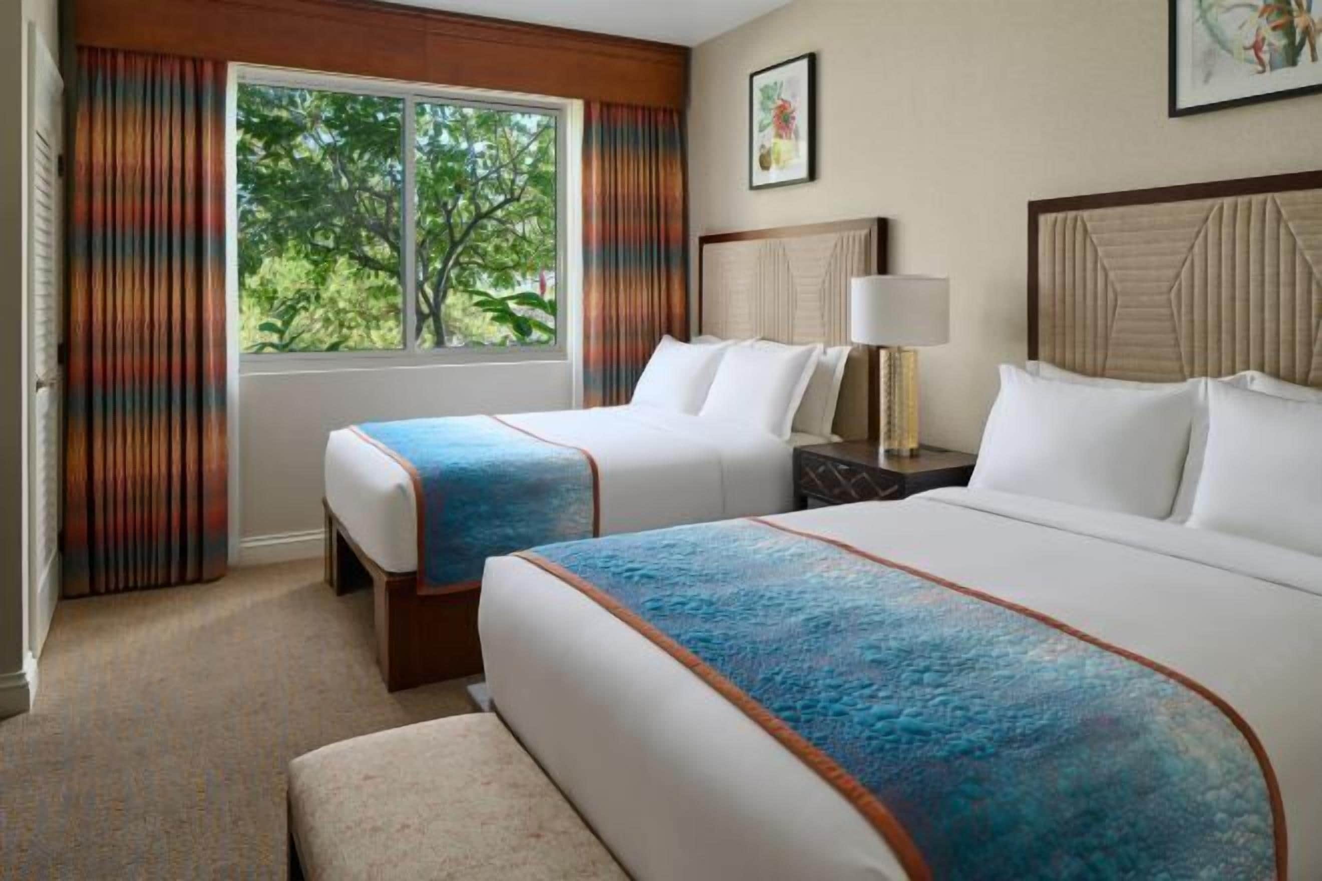 Premium bedding, down comforters, pillowtop beds, in-room safe