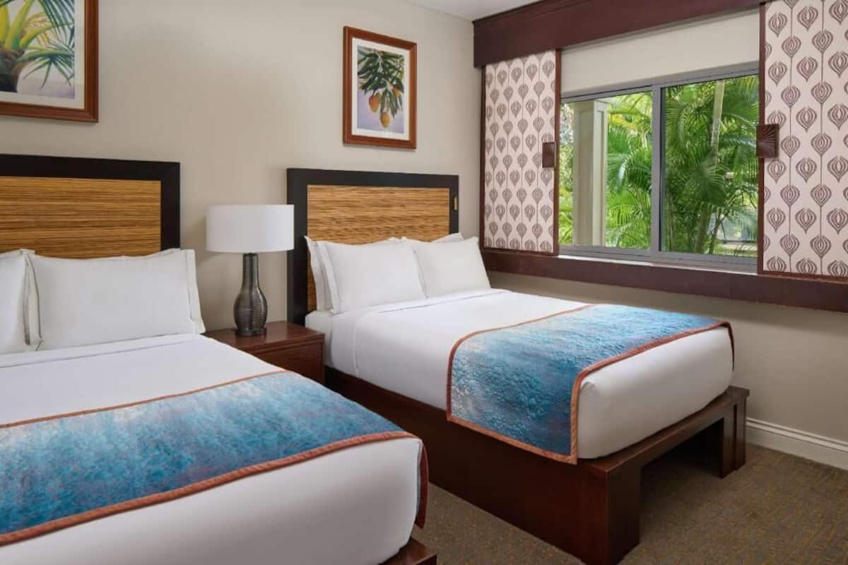 Premium bedding, down comforters, pillowtop beds, in-room safe