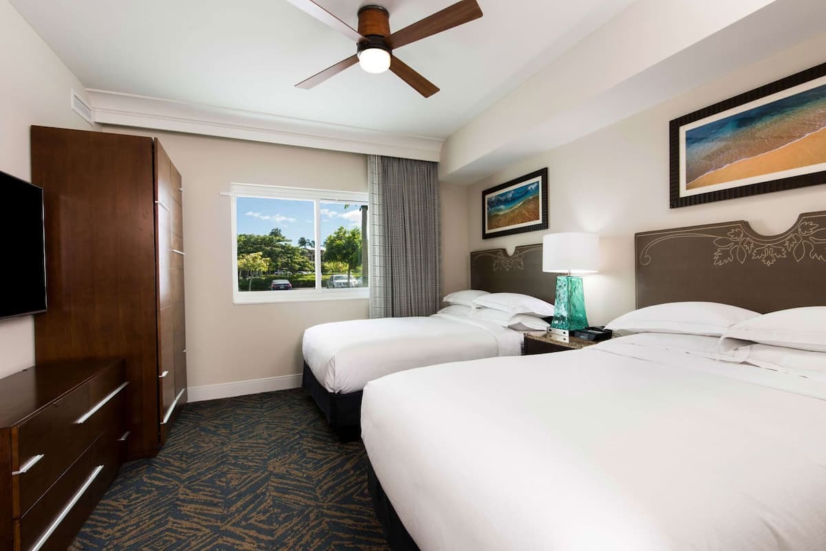 Premium bedding, down comforters, pillowtop beds, in-room safe