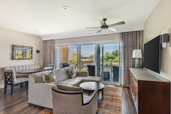 2 BDRM 1KING 2DBL GOLFVIEW SUITE W/ SOFABED | Living area | 50-inch LCD TV with cable channels, TV at Hilton Grand Vacations Club Kings
