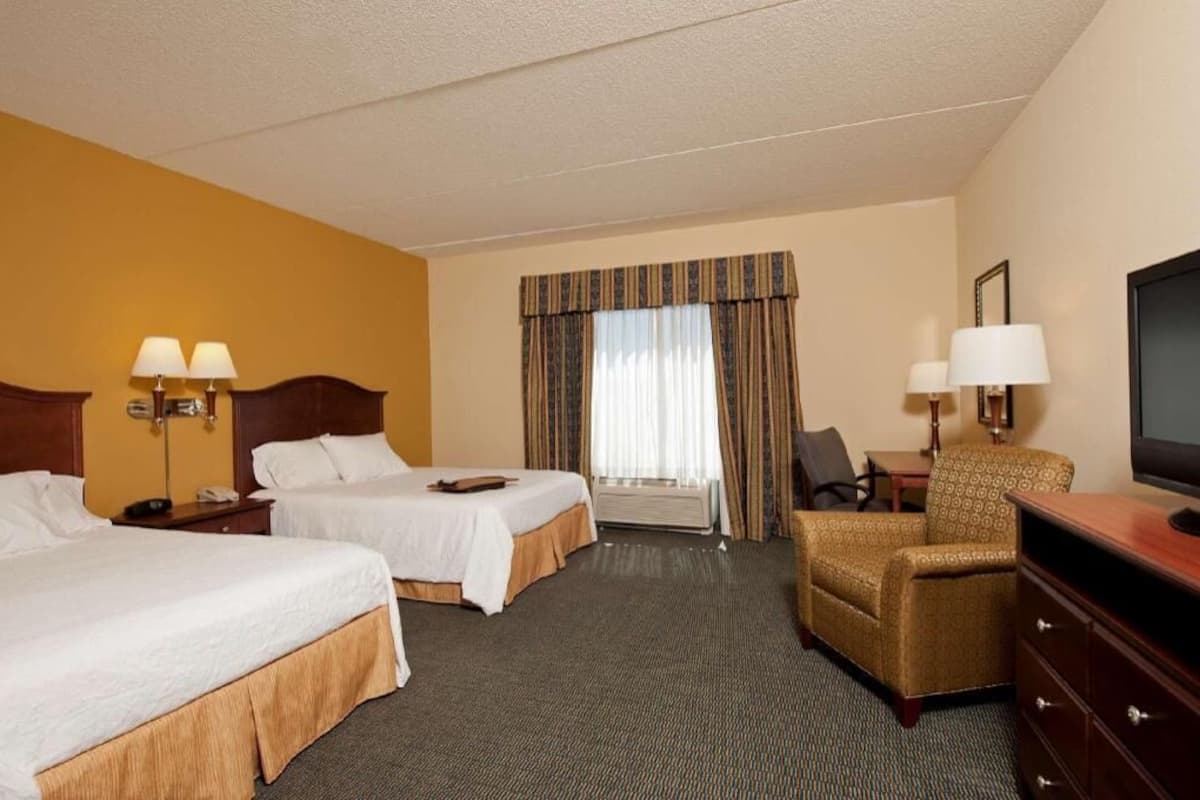 Premium bedding, down duvets, pillow-top beds, in-room safe