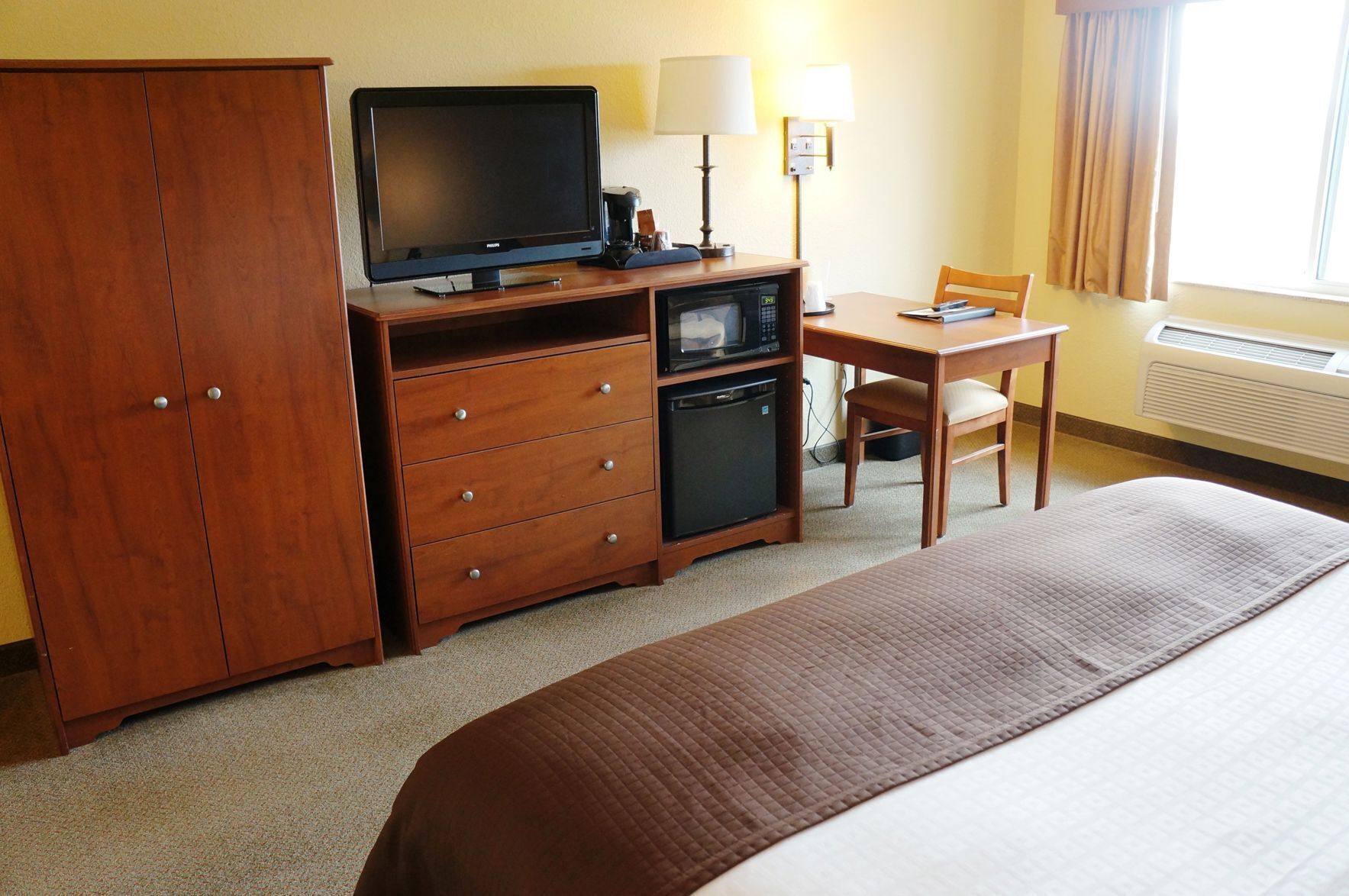 Individually decorated, individually furnished, desk, blackout drapes