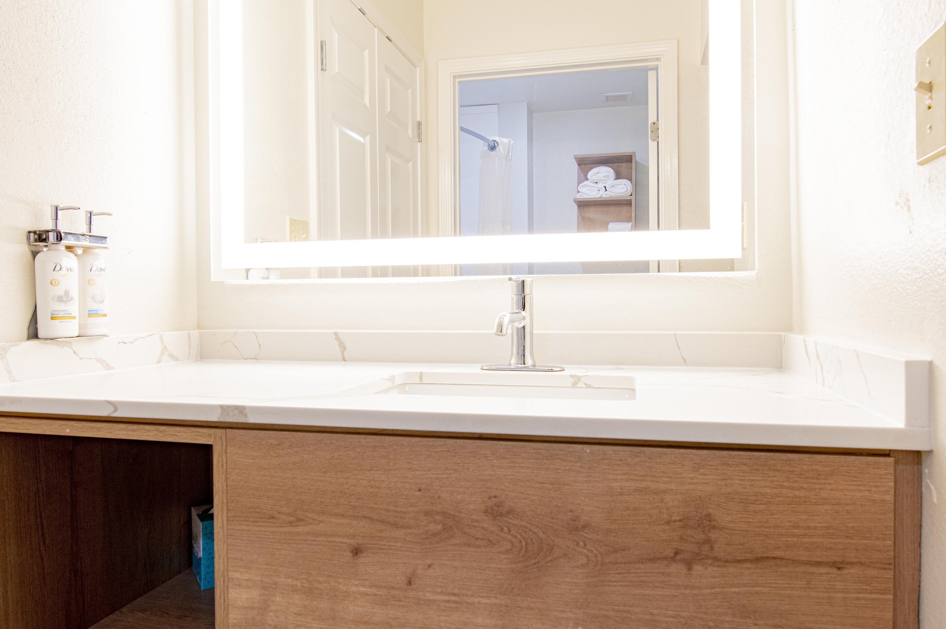 Desk, blackout drapes, iron/ironing board, free cribs/infant beds