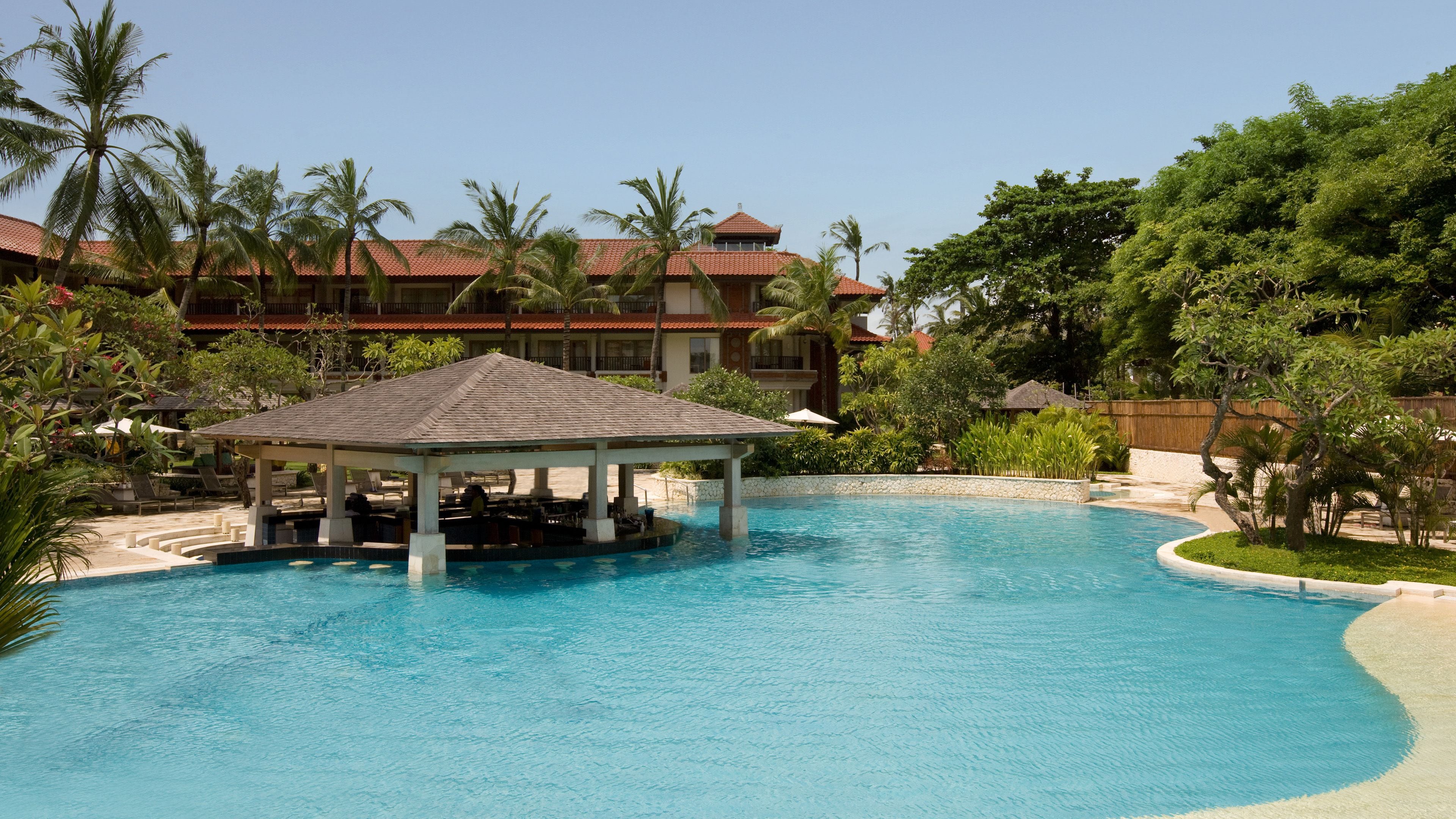 Outdoor pool, open 7:00 AM to 8:00 PM, free cabanas, pool umbrellas