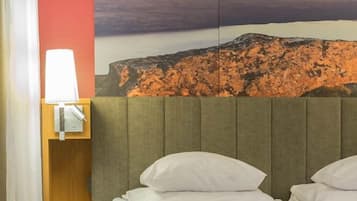 Minibar, coffres-forts dans les chambres, fer et planche Ă repasser