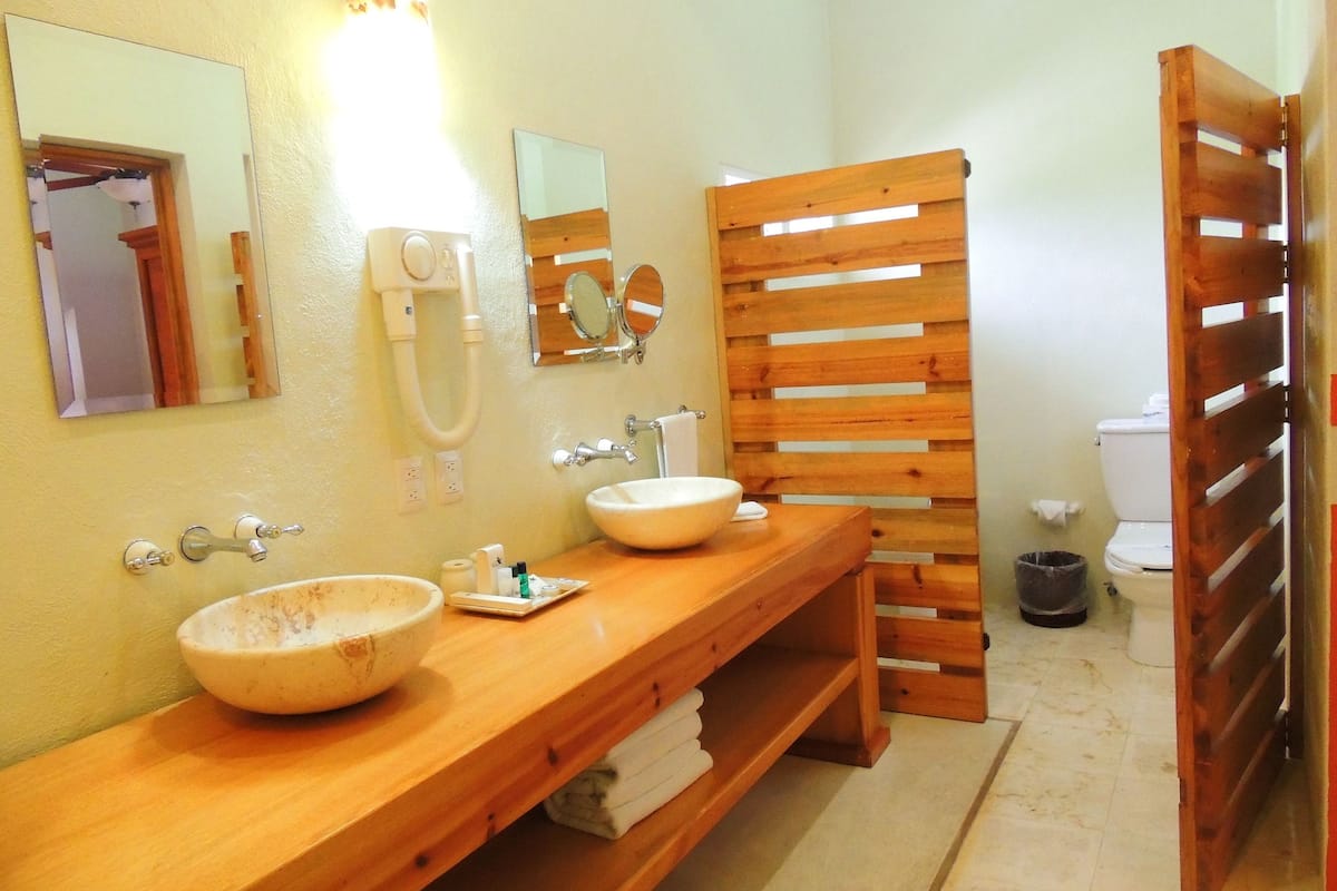 suite (master) | bathroom | designer toiletries, hair dryer, towels, soap