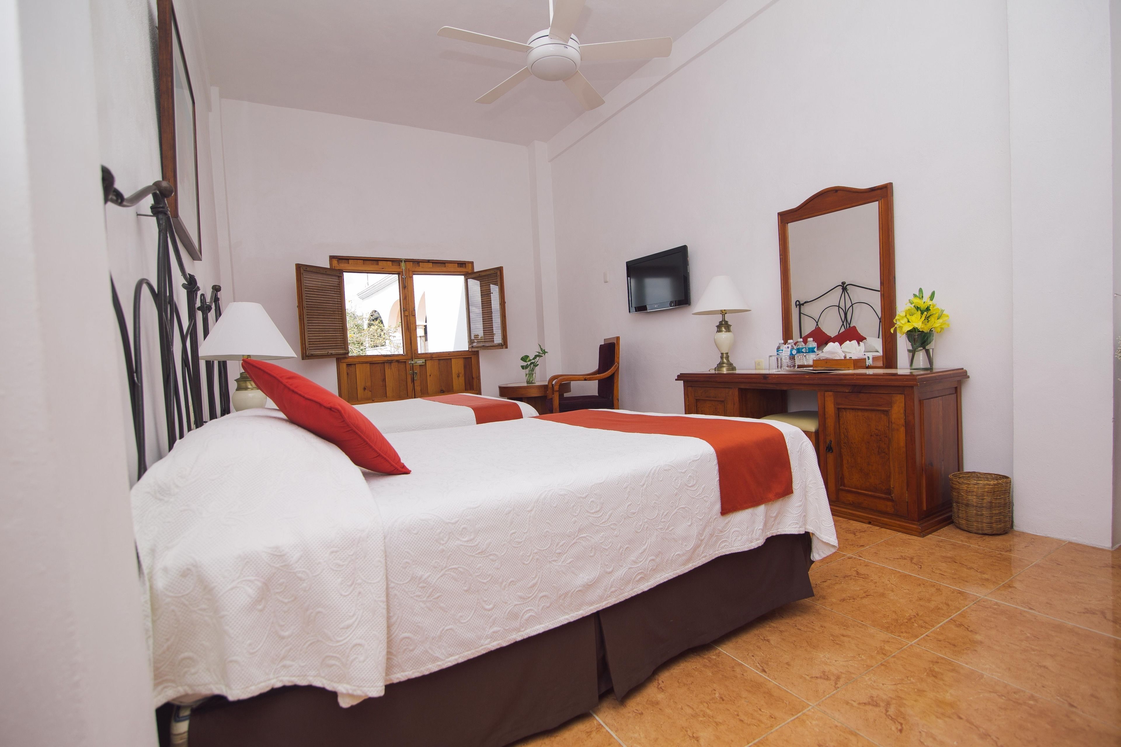 Premium bedding, in-room safe, individually decorated