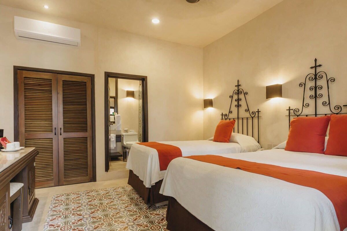 Premium bedding, in-room safe, desk, iron/ironing board (on request)