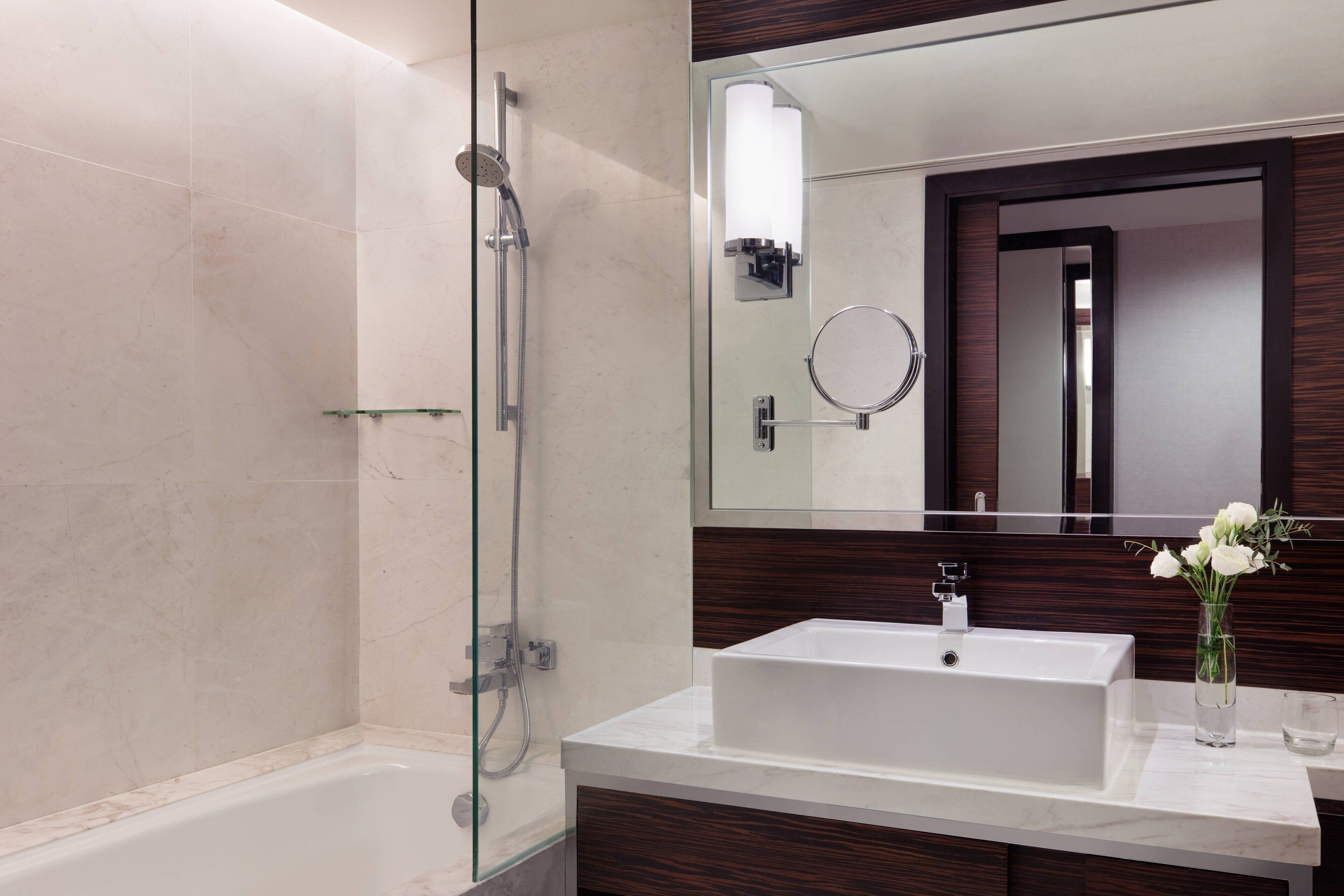 designer toiletries, hair dryer, bathrobes, slippers