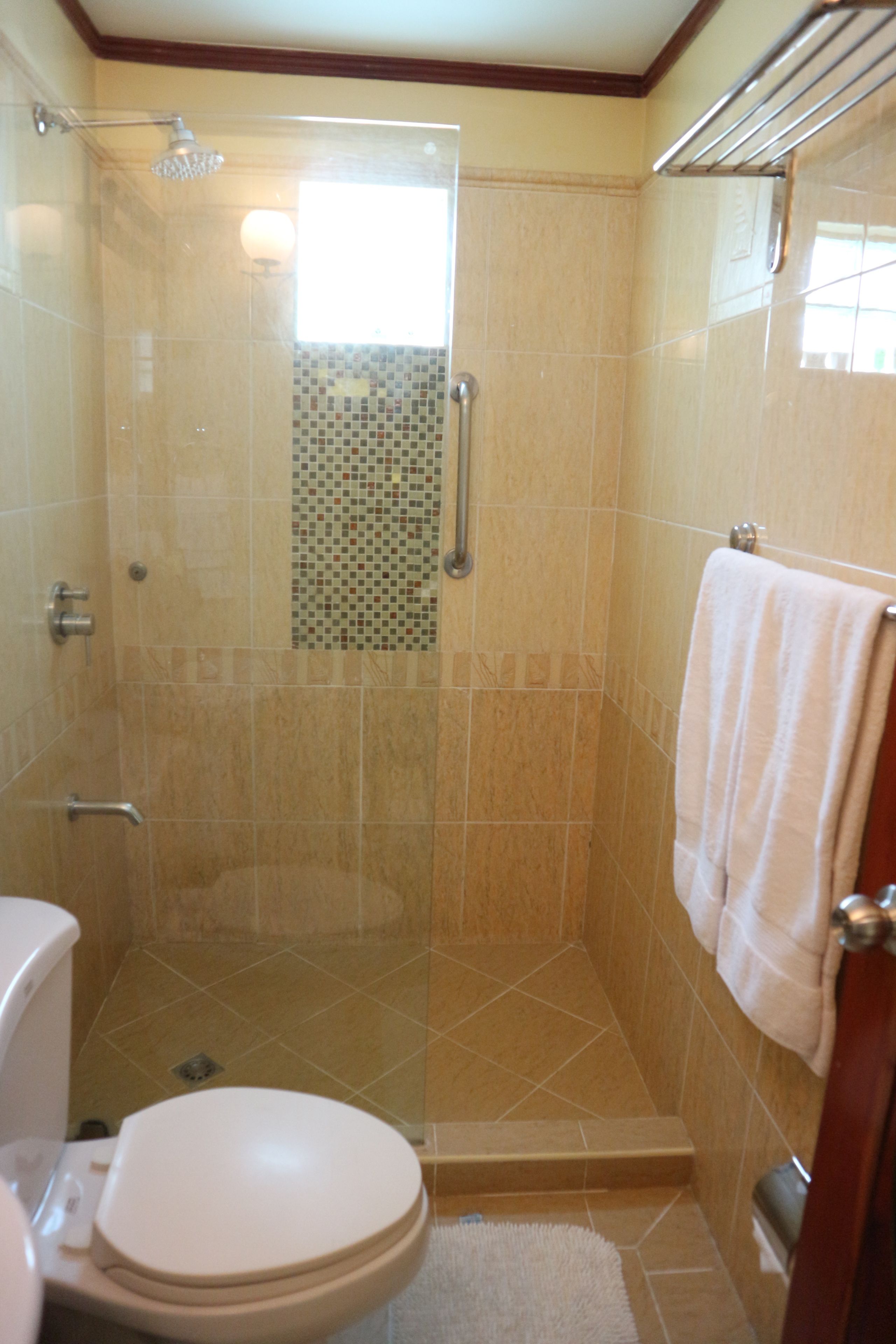 deluxe room, 1 king bed | bathroom | shower, free toiletries, hair dryer, towels