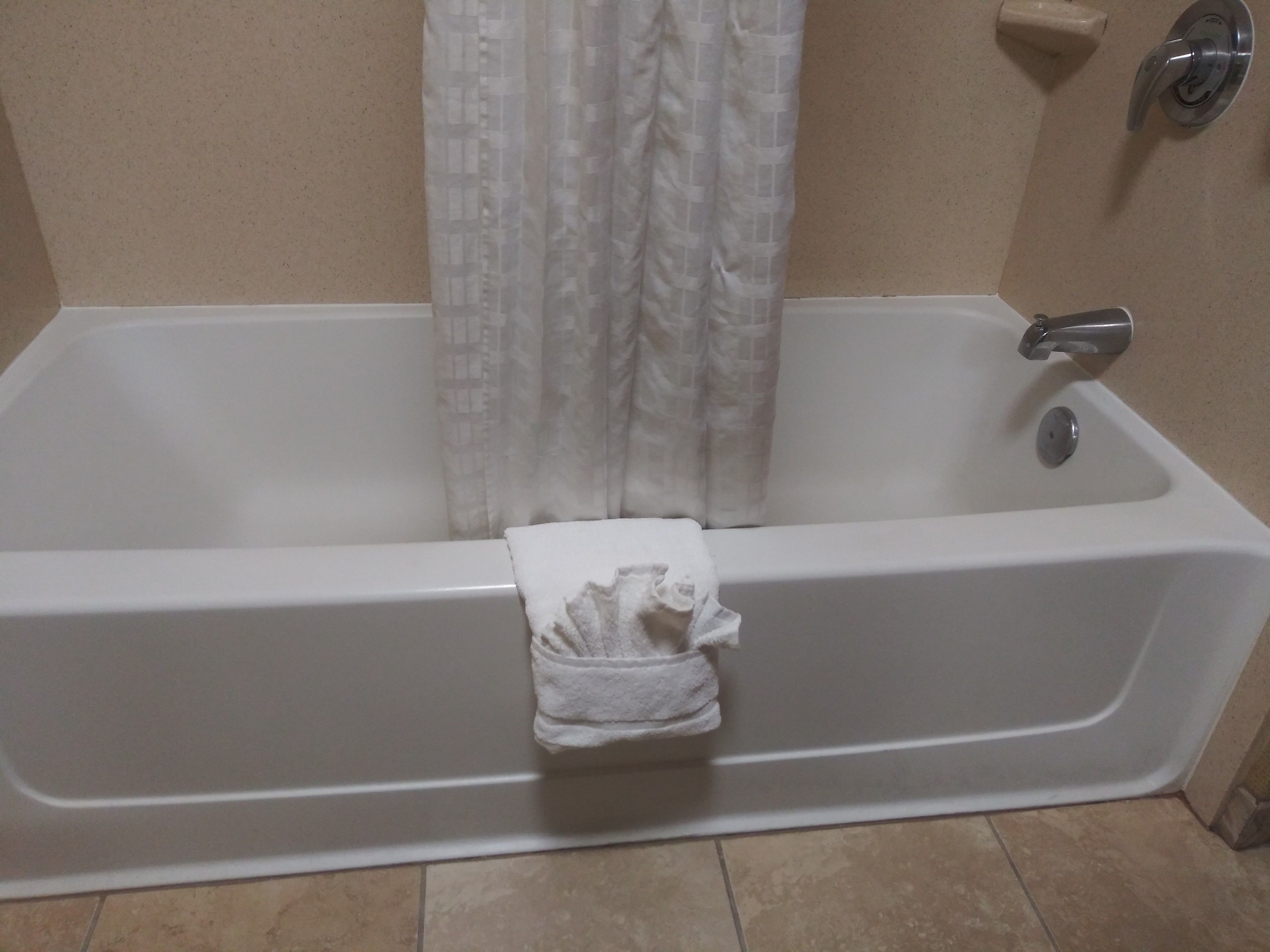 combined shower/bathtub, free toiletries, hair dryer, towels