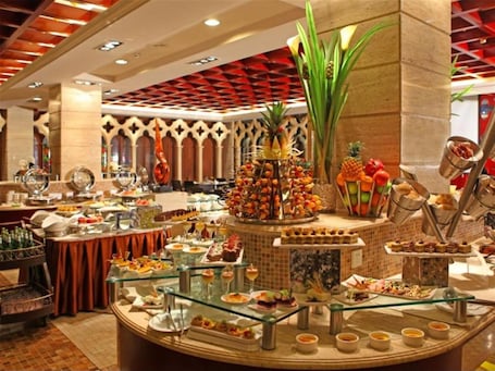 3 restaurants; breakfast, lunch and dinner served . Dalian East Hotel