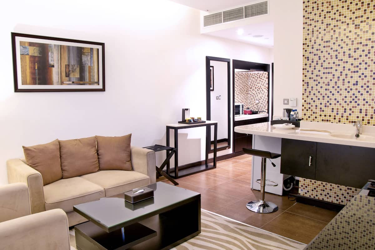 quartz studio | premium bedding, minibar, in-room safe, desk