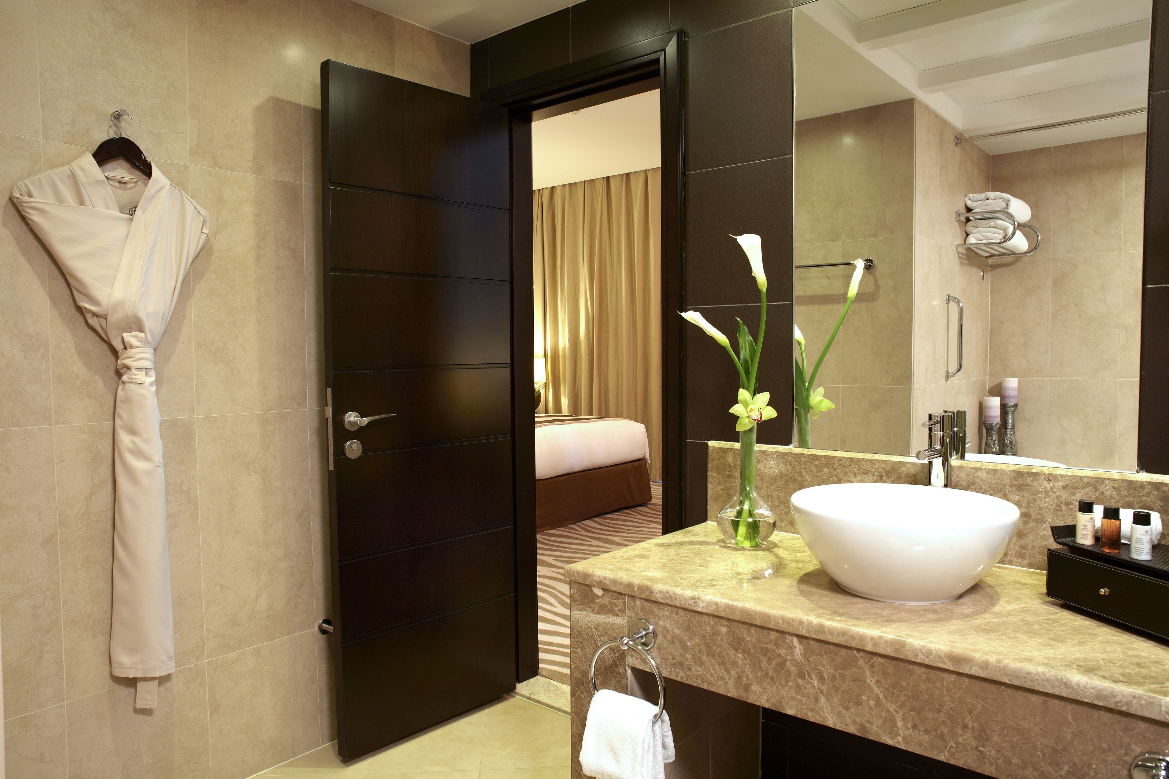 combined shower/bathtub, free toiletries, hair dryer, bathrobes