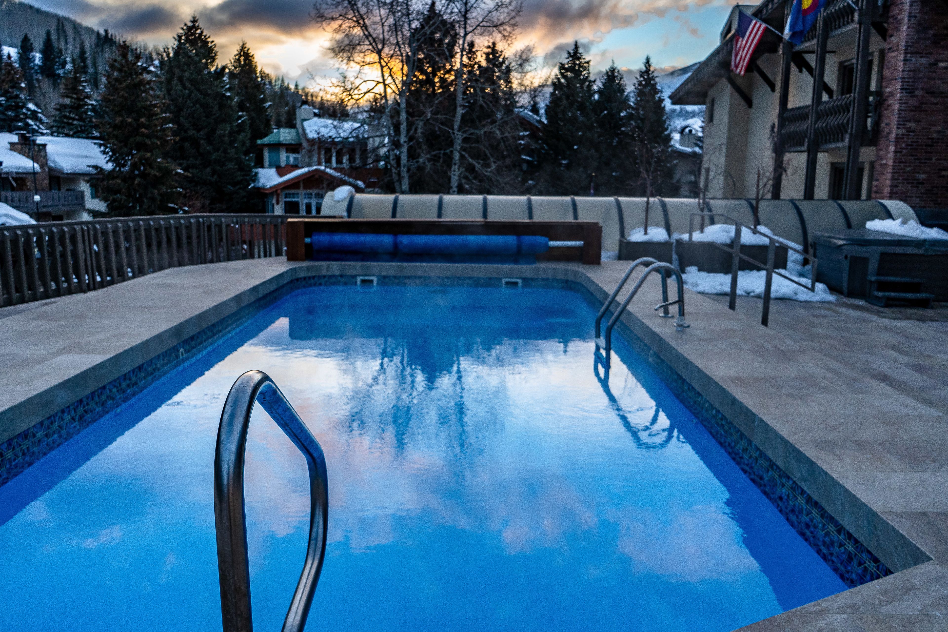 outdoor pool, pool umbrellas, pool loungers