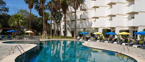 Outdoor pool, open 9:00 AM to 8:00 PM, pool umbrellas, pool loungers